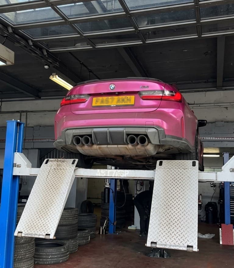 Mechanic working on a car